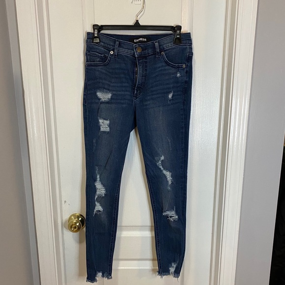 Express raw hem destroyed skinny jeans